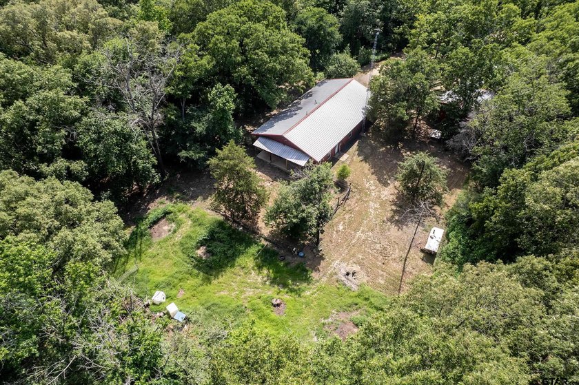 Looking for acreage, a shop, and a move-in ready home in Lindale - photo 25