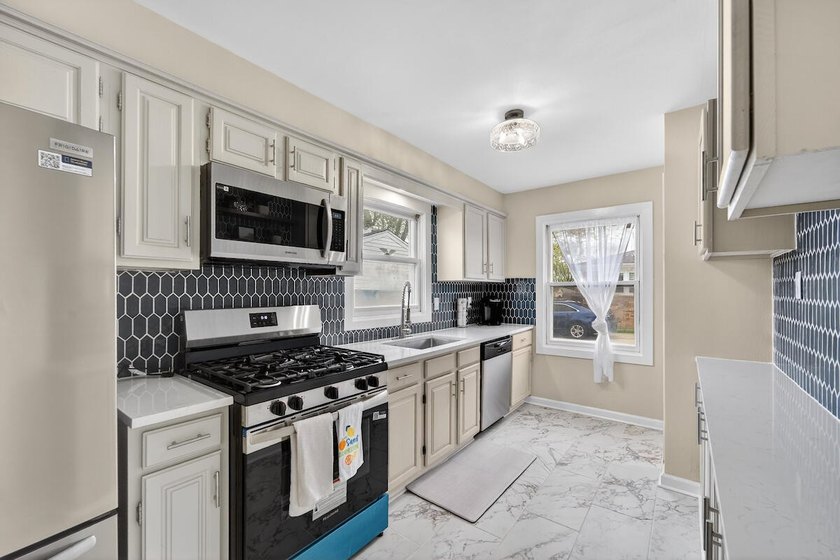 Okay, can we talk about this GEM?! This beautifully renovated - photo 6