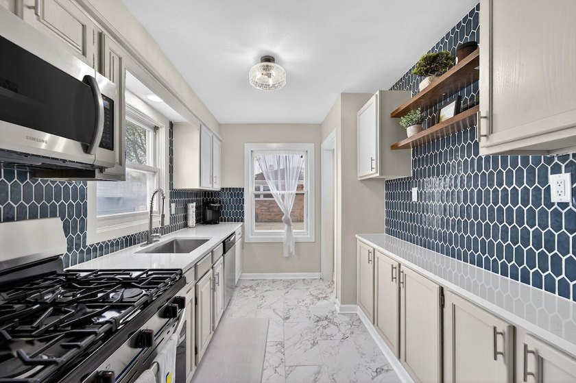 Okay, can we talk about this GEM?! This beautifully renovated - photo 7