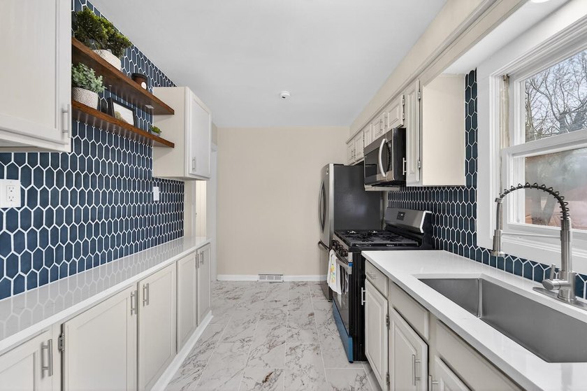 Okay, can we talk about this GEM?! This beautifully renovated - photo 8
