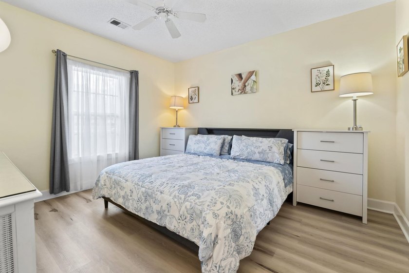 This stunning second-floor 1-bedroom, 1.5-bath condo offers - photo 12