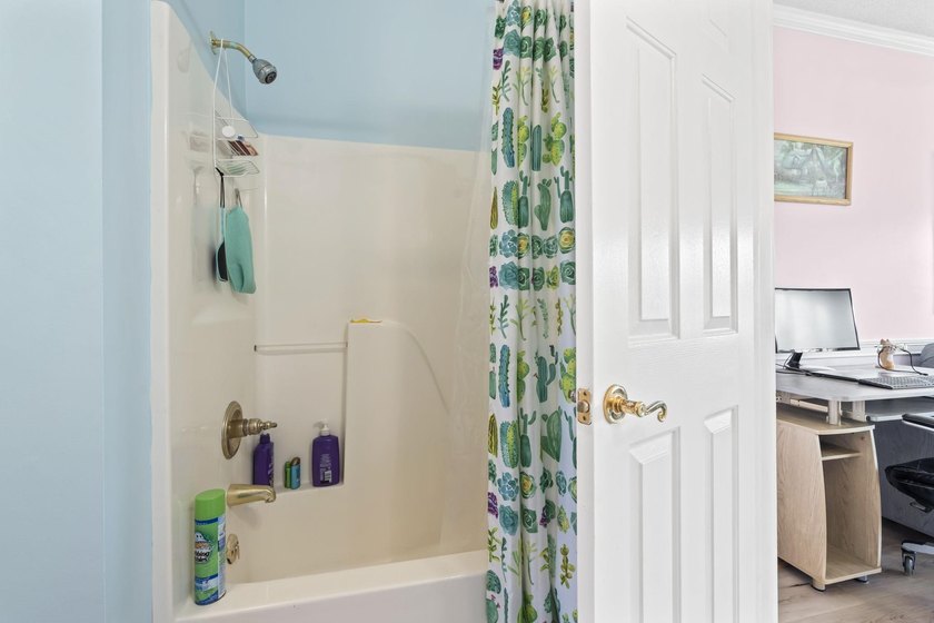 This stunning second-floor 1-bedroom, 1.5-bath condo offers - photo 13