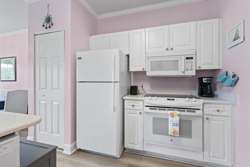 This stunning second-floor 1-bedroom, 1.5-bath condo offers - photo 14
