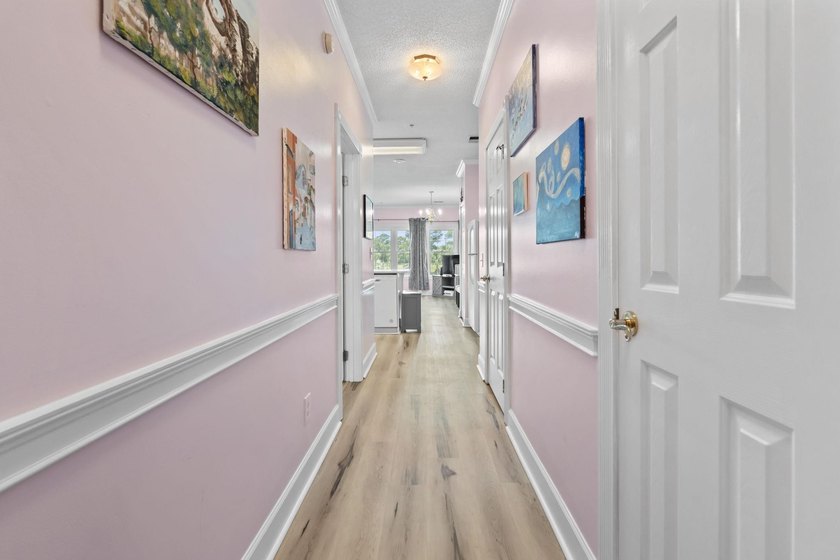 This stunning second-floor 1-bedroom, 1.5-bath condo offers - photo 15