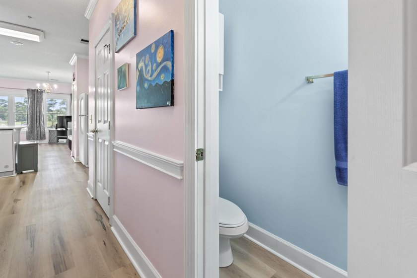 This stunning second-floor 1-bedroom, 1.5-bath condo offers - photo 18