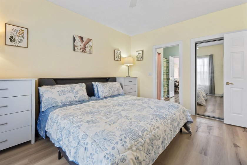 This stunning second-floor 1-bedroom, 1.5-bath condo offers - photo 19