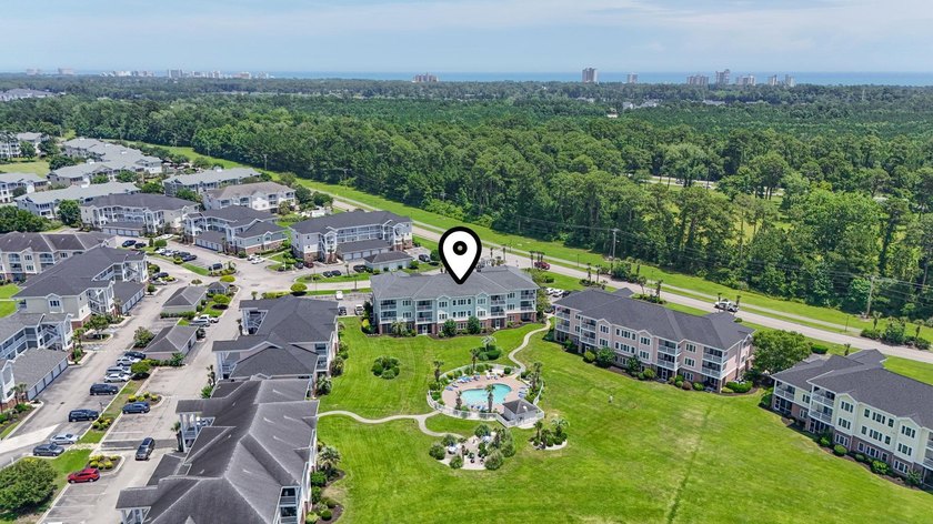 This stunning second-floor 1-bedroom, 1.5-bath condo offers - photo 22