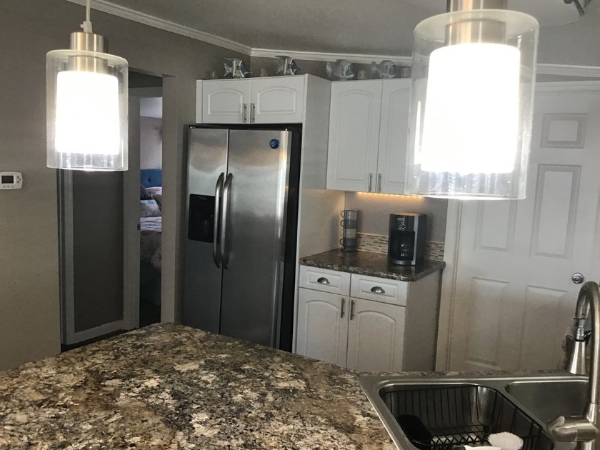 *SPECTACULAR updated corner **Key West Vibe **Unit Located in a - photo 8