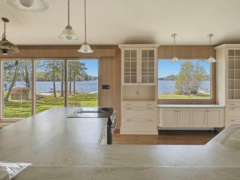 Experience exceptional lake living on Boom Lake, part of the - photo 15