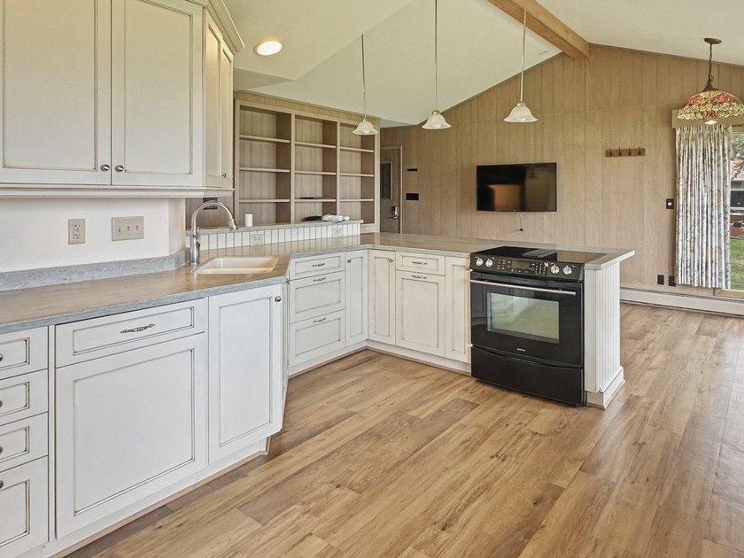 Experience exceptional lake living on Boom Lake, part of the - photo 16