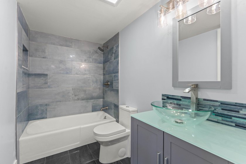 Newly remodeled 2/2 waterfront North Palm condo available on the - photo 28