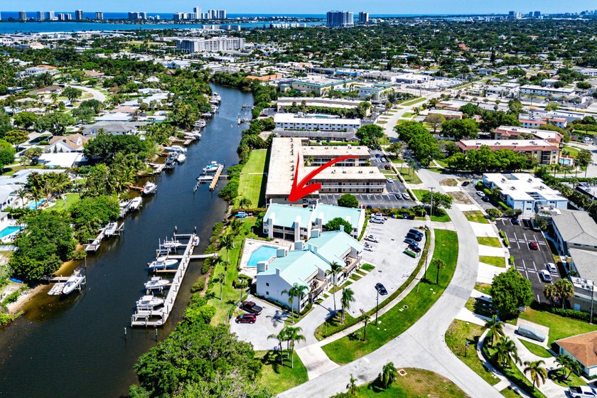 Newly remodeled 2/2 waterfront North Palm condo available on the - photo 34