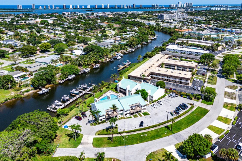Newly remodeled 2/2 waterfront North Palm condo available on the - photo 35