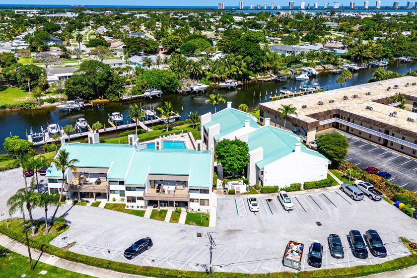 Newly remodeled 2/2 waterfront North Palm condo available on the - photo 37