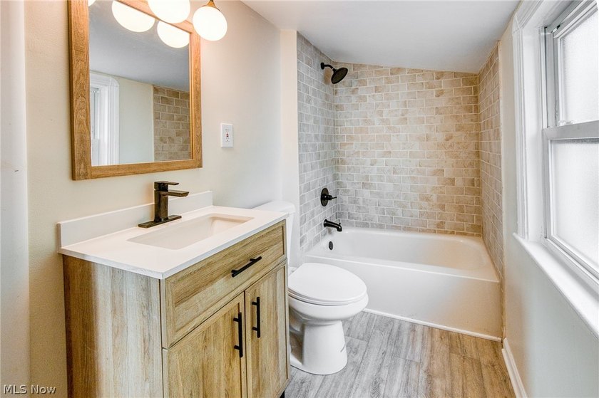 Move-in ready. Fresh updates. Prime location. This one feels - photo 11