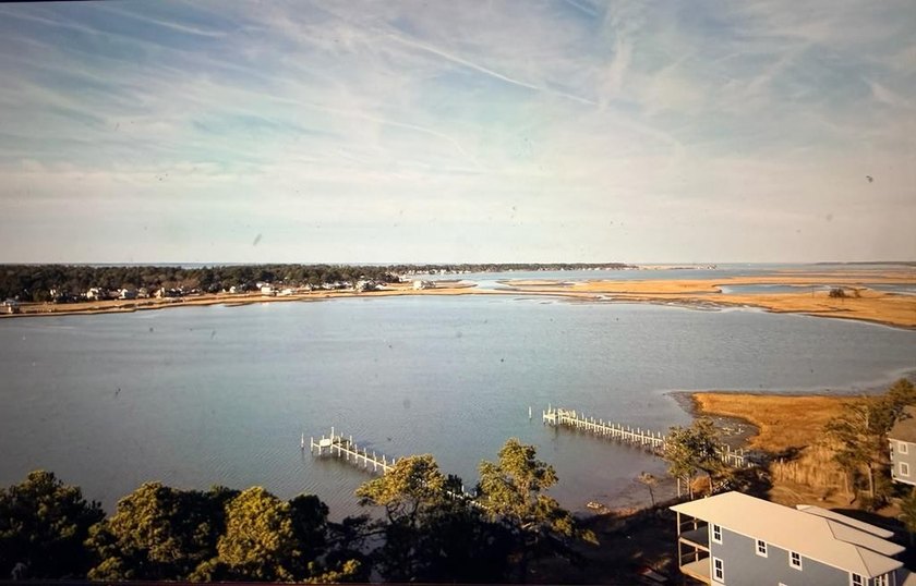 Build your dream coastal retreat on this .728-acre waterfront - photo 3
