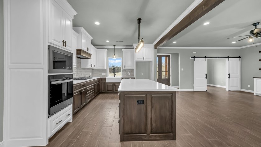 This proposed Ava plan features 3 beds 2 full baths, a - photo 14