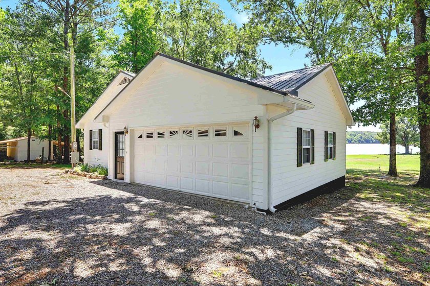 Unparalleled Lake Oconee Lakefront Opportunity with - photo 3