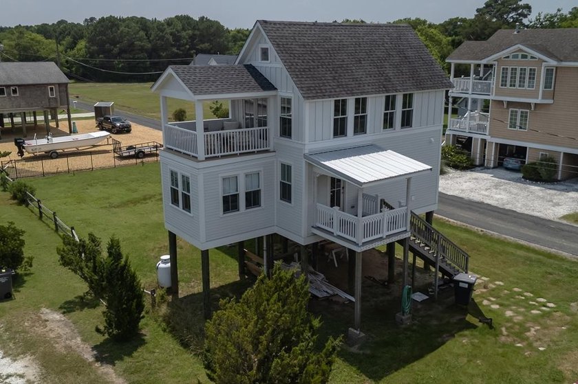 OYSTER COTTAGE - Rare opportunity to own an authentic turn of - photo 2