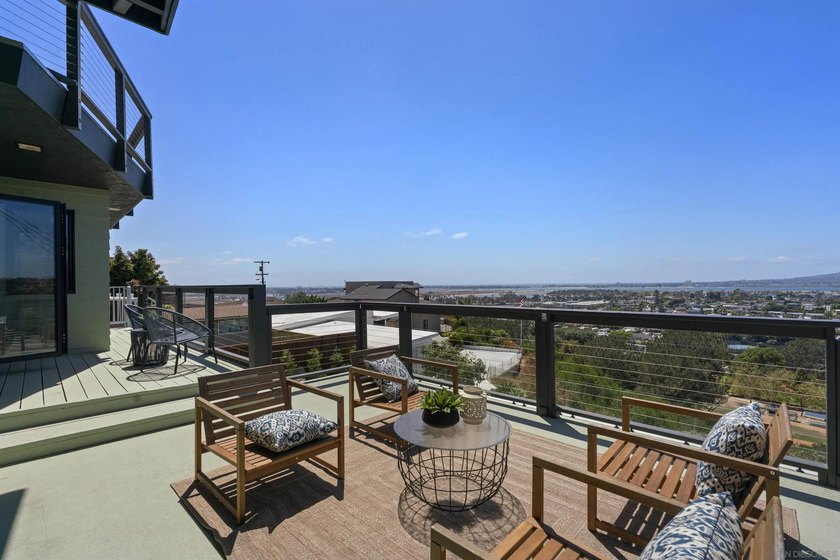Commandingly perched in coveted Bay Park, this extraordinary - photo 13