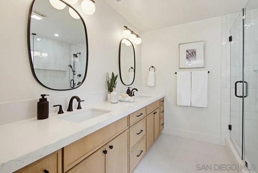Commandingly perched in coveted Bay Park, this extraordinary - photo 23