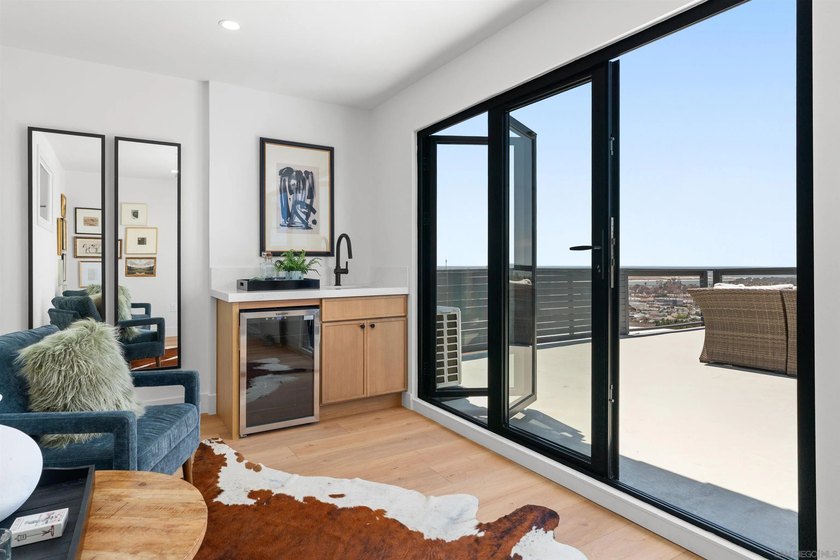 Commandingly perched in coveted Bay Park, this extraordinary - photo 26