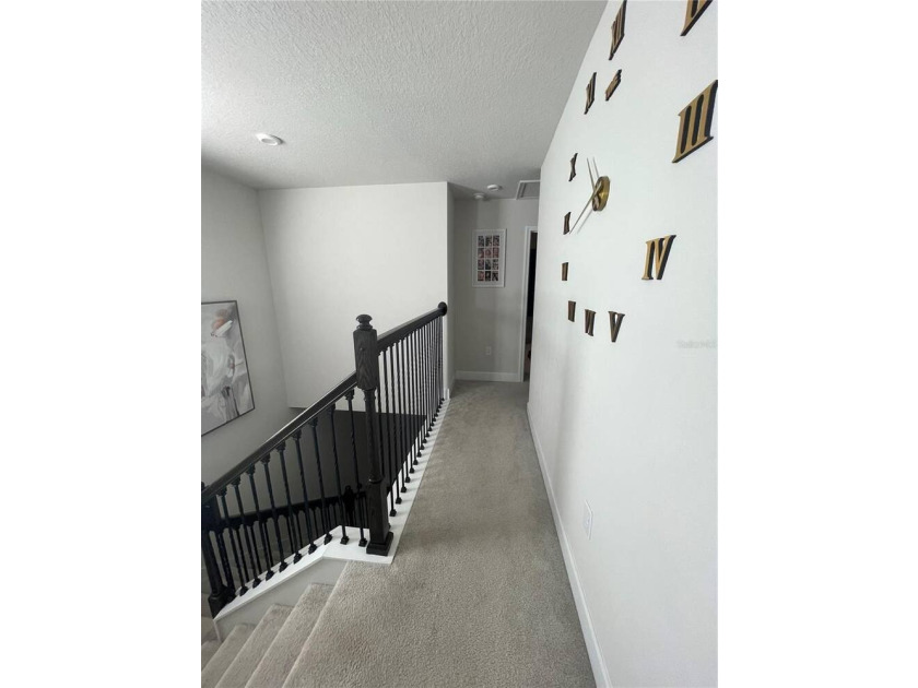 Built in 2023, this beautifully upgraded 5-bedroom, 3-bath home - photo 49