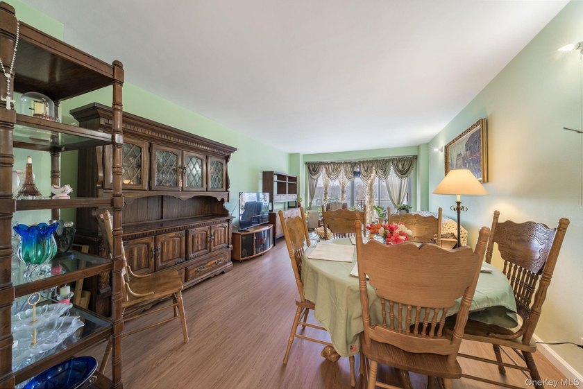 Welcome to this inviting residence at 85-15 Main Street, ideally - photo 4