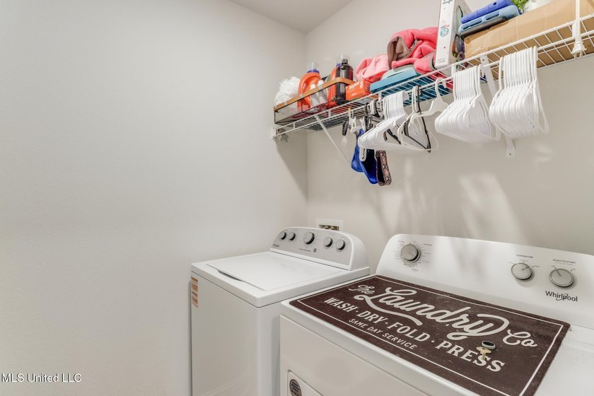 New price! Unlike new builds, this home is truly move-in ready - photo 16