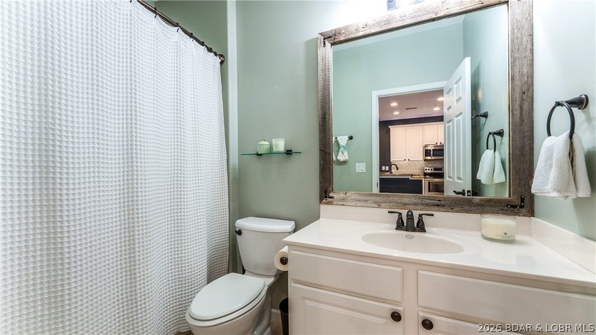Situated in one of Osage Beach's most desirable gated - photo 17