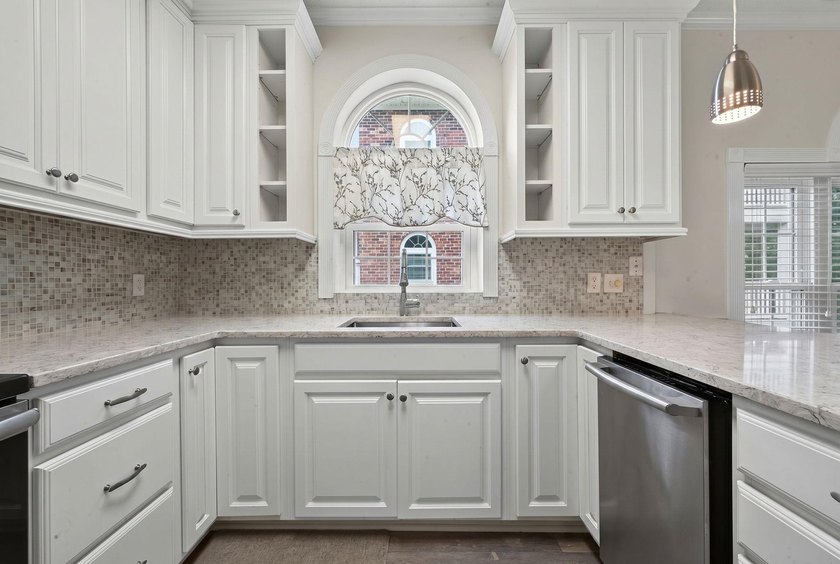 Move-in ready, two-bedroom, two-bathroom end-unit condo with - photo 11