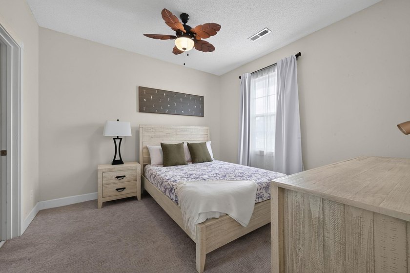 Move-in ready, two-bedroom, two-bathroom end-unit condo with - photo 24
