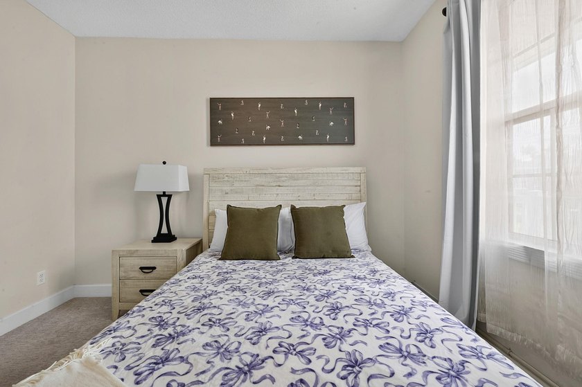 Move-in ready, two-bedroom, two-bathroom end-unit condo with - photo 27
