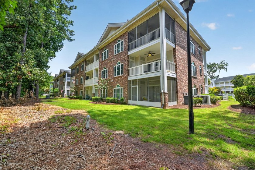 Move-in ready, two-bedroom, two-bathroom end-unit condo with - photo 34