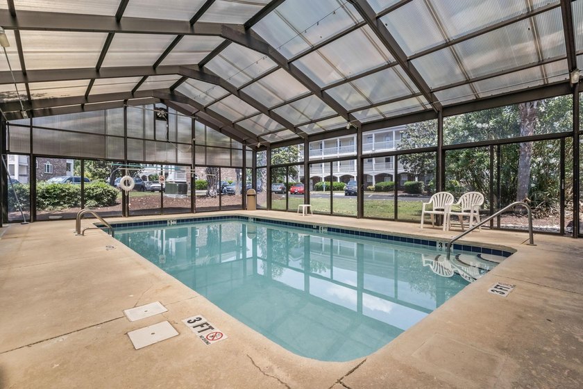 Move-in ready, two-bedroom, two-bathroom end-unit condo with - photo 35