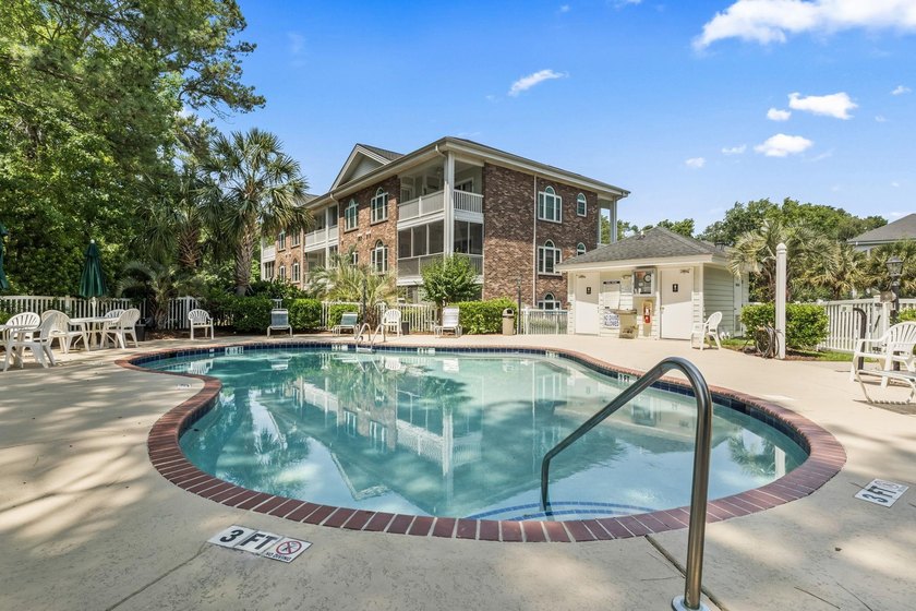 Move-in ready, two-bedroom, two-bathroom end-unit condo with - photo 36