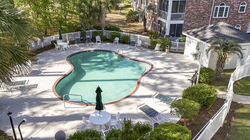 Move-in ready, two-bedroom, two-bathroom end-unit condo with - photo 39