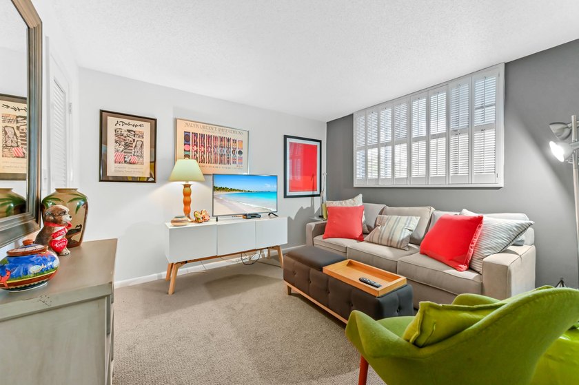 Discover the ease of ground-floor living in this charming condo - photo 20