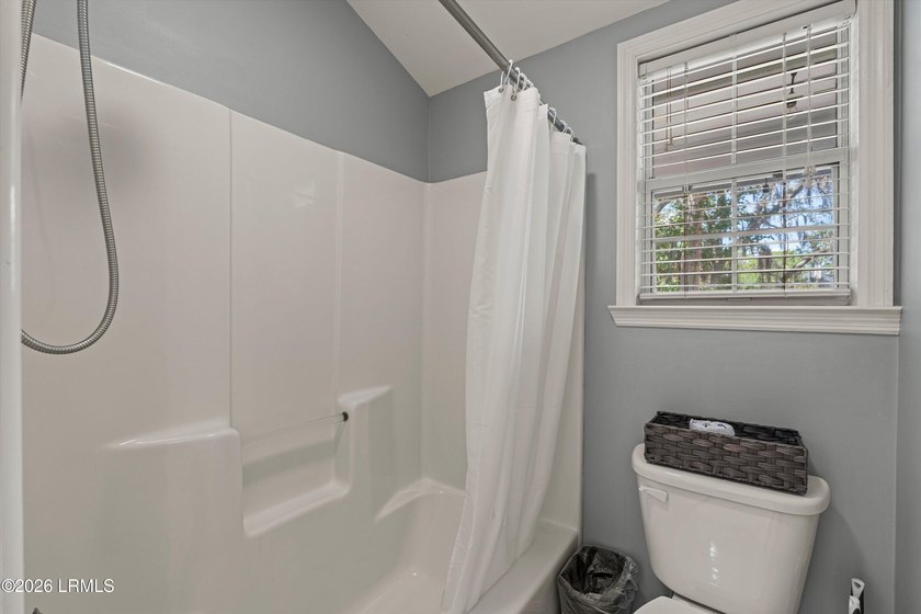 Tucked away within the gated community of Harbor Island, this - photo 20