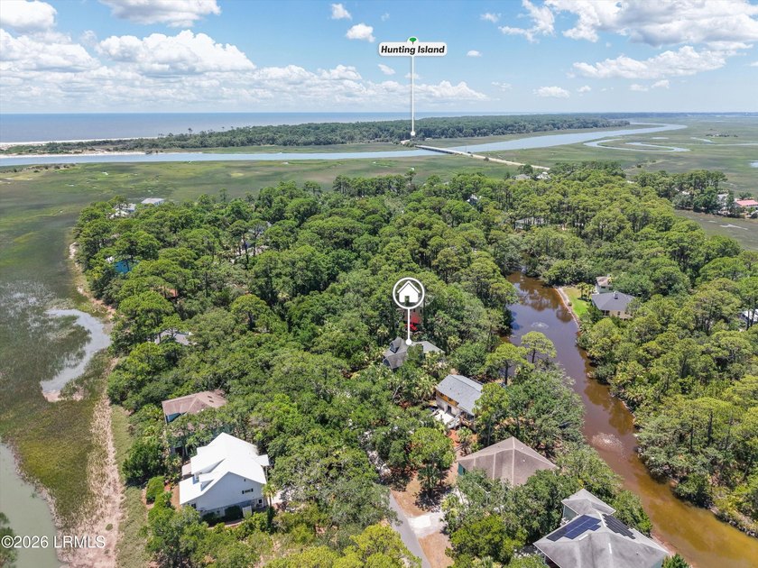 Tucked away within the gated community of Harbor Island, this - photo 47