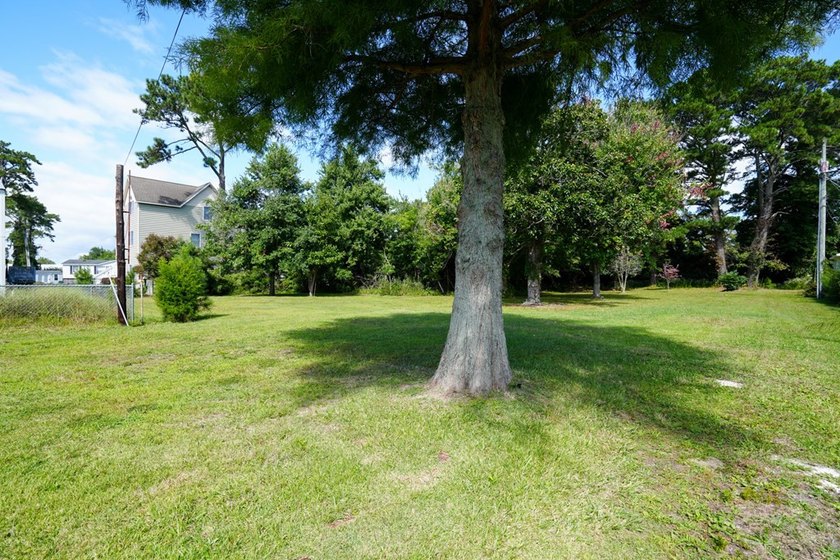 Unlock the full potential of this rare vacant lot with - photo 2