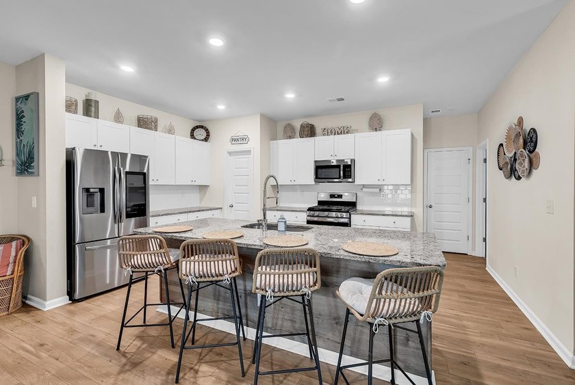 Welcome home to Coastal Charm at the Beach, a beautifully - photo 11