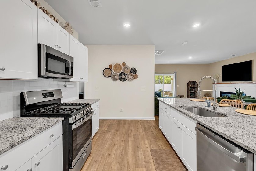 Welcome home to Coastal Charm at the Beach, a beautifully - photo 14