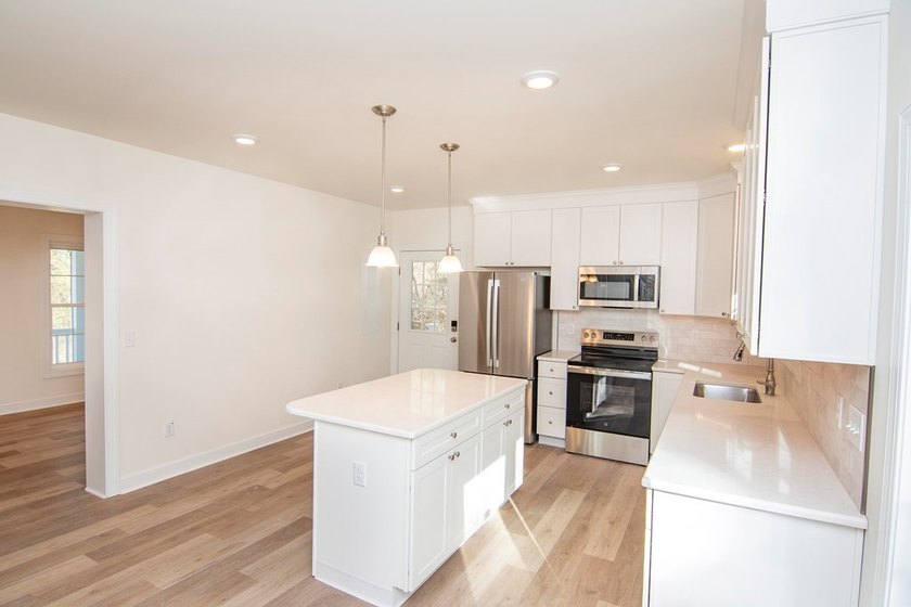 Discover modern coastal living in this stunning 3-bedroom - photo 4