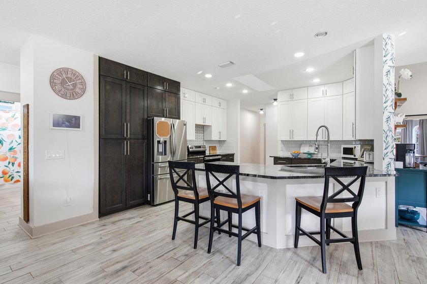 Welcome to your forever home in the pristine, gated enclave of - photo 25