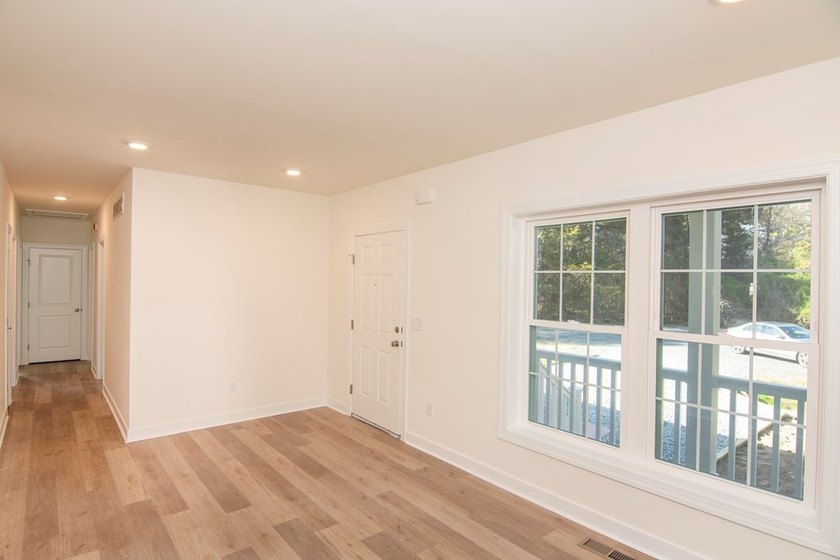 Discover modern coastal living in this stunning 3-bedroom - photo 6
