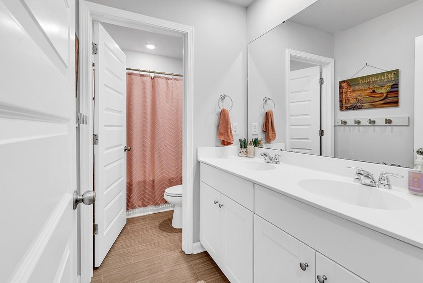 Welcome home to Coastal Charm at the Beach, a beautifully - photo 29