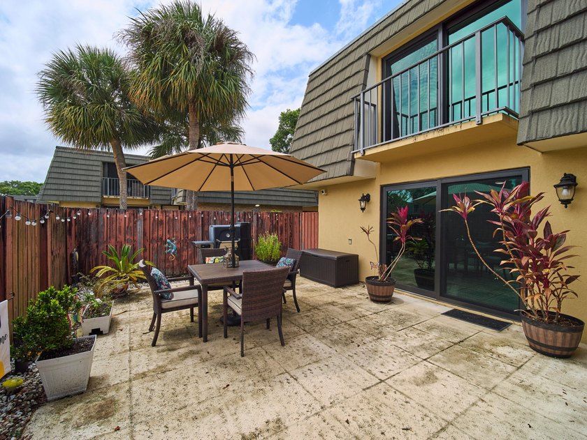 Complete impact sliders and brand-new A/C! This cozy townhome - photo 20