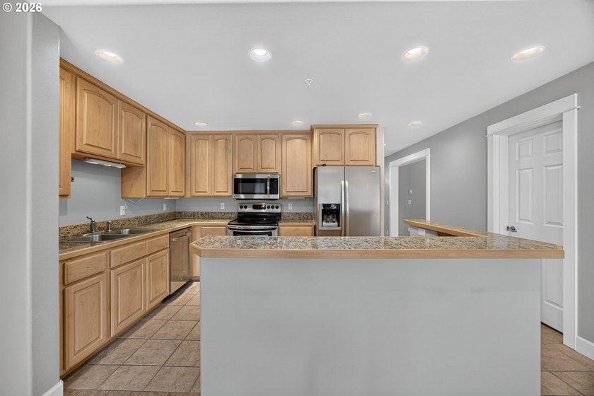 Perched on the third floor, this immaculate 2-bedroom, 2-bath - photo 9