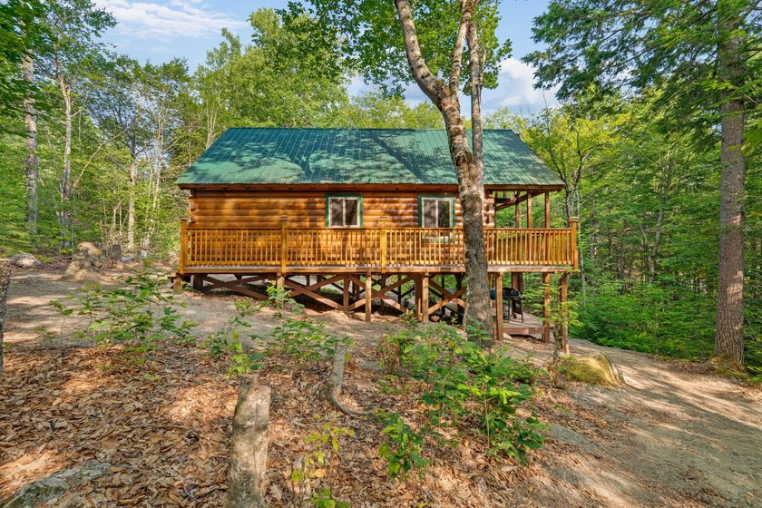 Discover a rare opportunity on Bill Green Pond with this - photo 2